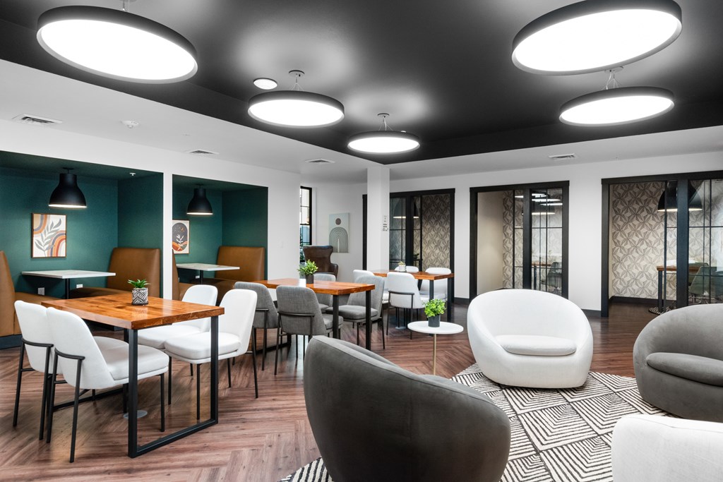 a room filled with furniture and a large window